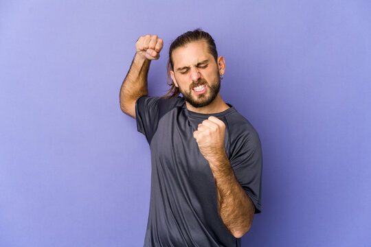 Young man with long hair look shouting very angry, rage concept, frustrated.