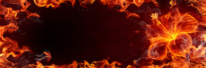 Burning flower made of real fire flames, smoke and sparks.