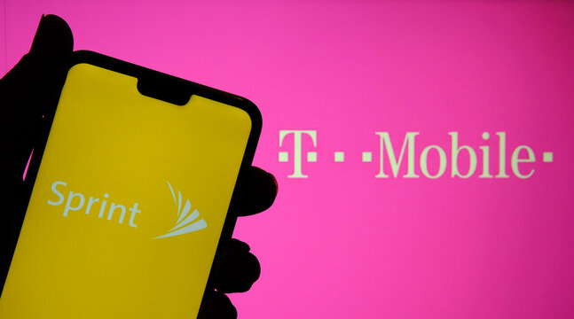 Stone / United Kingdom - February 16 2020: Sprint And T Mobile Logos On The Screens Of Mobile Devices. Concept For Merger Of Two Companies. Real Photo, No Edit In Post.