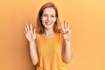Young caucasian woman wearing casual style with sleeveless shirt showing and pointing up with...