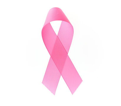 Pink breast cancer ribbon over isolated white background.