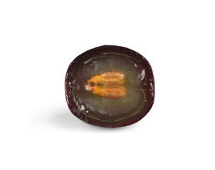 Half of delicious ripe dark blue grape isolated on white