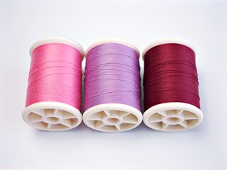 sewing thread and needle ,Sewing spool of thread and scissors isolated on white background	