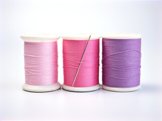 sewing thread and needle ,Sewing spool of thread and scissors isolated on white background	