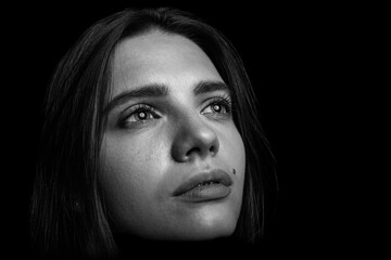 Fototapeta premium Black and white portrait of a young woman