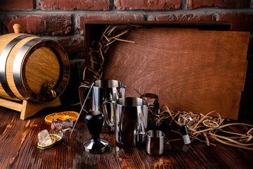 Fototapeta na wymiar Set of Stainless Steel Milk Pitchers Jugs. Foaming Jug for barista. Coffee Accessories. Barista Kit