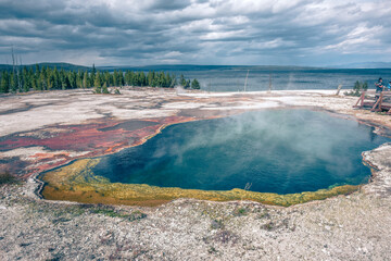 Hot thermal spring Abyss Pool in Yellowstone National Park, West Thumb Geyser Basin area, Wyoming, USA
