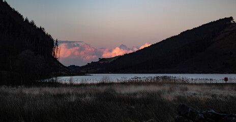 Sunset behind Llyn Geirionydd, Snowdonia from the shoreline. Winter landscape, taken in January.