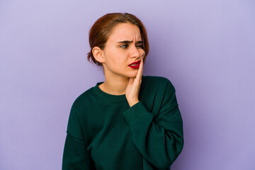 Fototapeta premium Young arab mixed race woman having a strong teeth pain, molar ache.