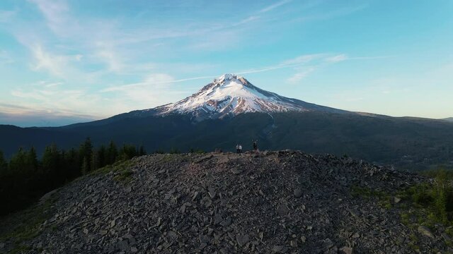 4K Aerial Flyover of People Group Hikers on summit ridge Mt Hood Oregon