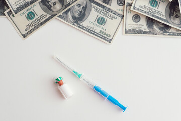 Vaccine for covid 19 and usa dollars isolated