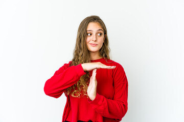 Young caucasian woman showing a timeout gesture.