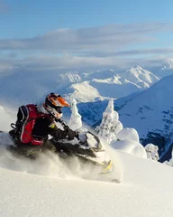 Fotobehang Backcountry snowmachine rider "sledder" in Alaska. © KBDESIGNPHOTO