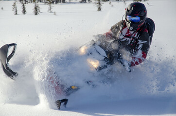 Backcountry snowmachine rider "sledder" in Alaska.