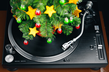 festive turntable with Christmas Tree branches with decorations
