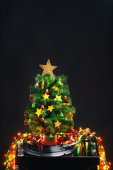 festive turntable and Christmas Tree with colorful led lights