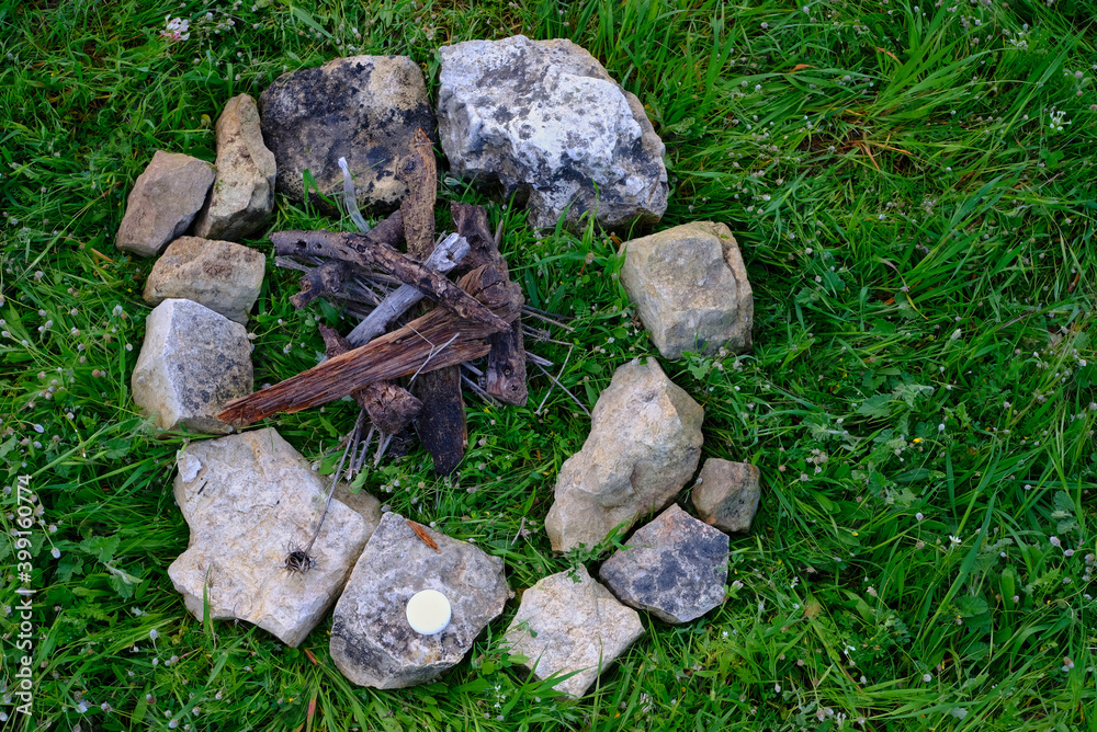 Wall mural campfire on green grass