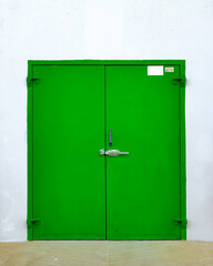 green door in a wall
