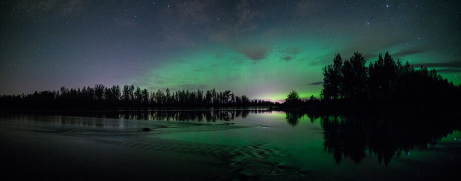 Aurora over river in Alaska © KBDESIGNPHOTO