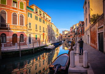 Fototapeta na wymiar Traditional water canal in morning light. Venice