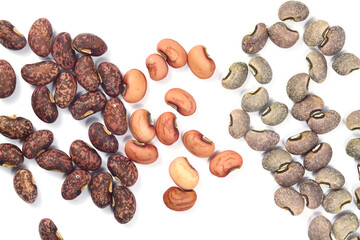 Top view of a group of dry nuts, gray, brown on white background