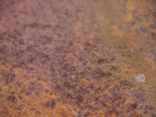 Oxidized metal surface, Closeup to rust on iron surface, Abstract rusty metal panel texture background, Selective focus.
