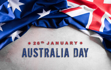 Fototapeta na wymiar Happy Australia day concept. Australian flag against old stone background. 26 January.