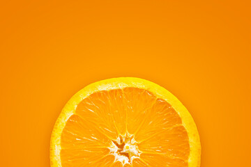 orange fruit on yellow and red background