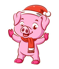 The cute pink pig is dancing her body using the Christmas hat and the red scarf