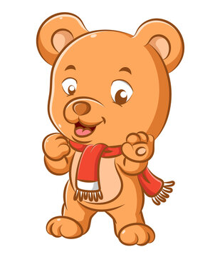Funny bear with the red shawl is standing with his feet and smiling with his little mouth