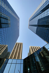 View of Calgary's downtown with skyscrapers in different angles. A study groups tied the city for 5th best city to live in. 