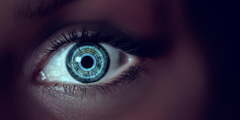 Close up of woman eye in process of scanning