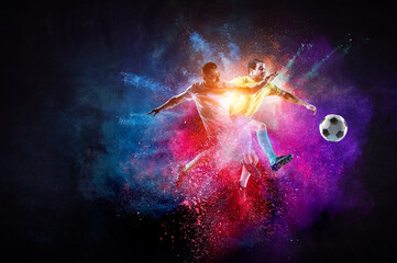 Boy playing soccer hitting the ball