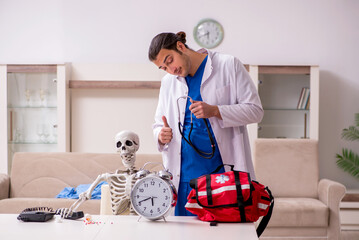 Young male paramedic visiting skeleton patient