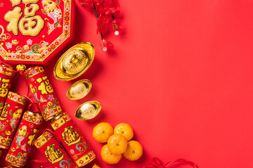 Chinese new year festival, Top view flat lay happy chinese new year or lunar new year decorations celebration with copy space on red background (Chinese character "fu" meaning fortune good luck)