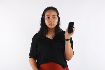 Full length view of trendy asian girl on white background.