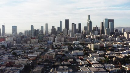 Aerial wide fast flying shot towards Downtown Los Angeles in 2020. 4K