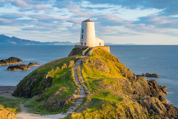 Lighthouse on Llanddwyn Island on the coast of Anglesey in North Wales,UK - obrazy, fototapety, plakaty