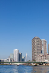 Fototapeta premium High-rise buildings against blue sky in Tokyo