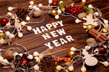 Christmas decorations on dark. Glowing garland and bokeh effect