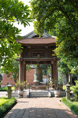 Square building holding a big bell on side of Imperial Academy in Temple of Literature (Van Mieu), the first national university in Hanoi