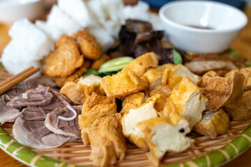 Vietnamese traditional plate pork vermicelli tofu (Bun Dau Mam Tom), the popular lunch set in Hanoi, Vietnam
