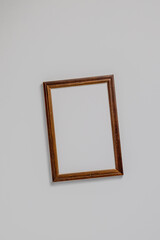 Empty brown wood border, with craft paper isolated on white table background.