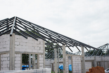 Obraz premium New home before install new roof tile with other in site,selective focus.