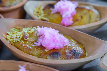 Thai dessert in small clay pots or bowls