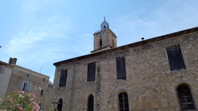 Huge clock tower standing tall and splendid in the town of Manosque, southern France