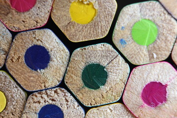 Multicolored pencils bottom macro view closeup background.