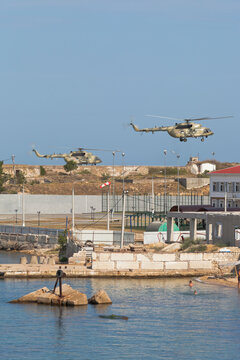 Helicopters Mi-8AMTSh of the Russian Aerospace Forces perform landing at the Konstantinovskaya battery in the city of Sevastopol, Crimea