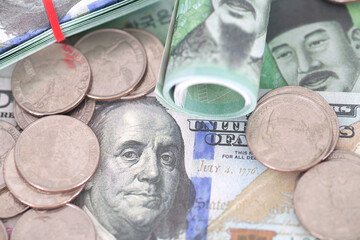 US dollar bills and Korean won bills and some coins