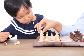 Chess teacher tutoring children